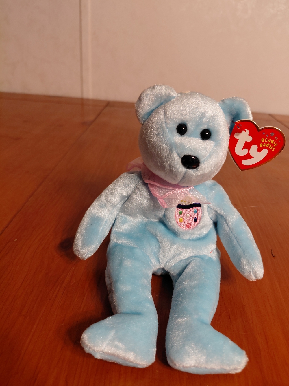 This is a Ty Beanie Baby plush named "Eggs II," a light blue bear originally rel